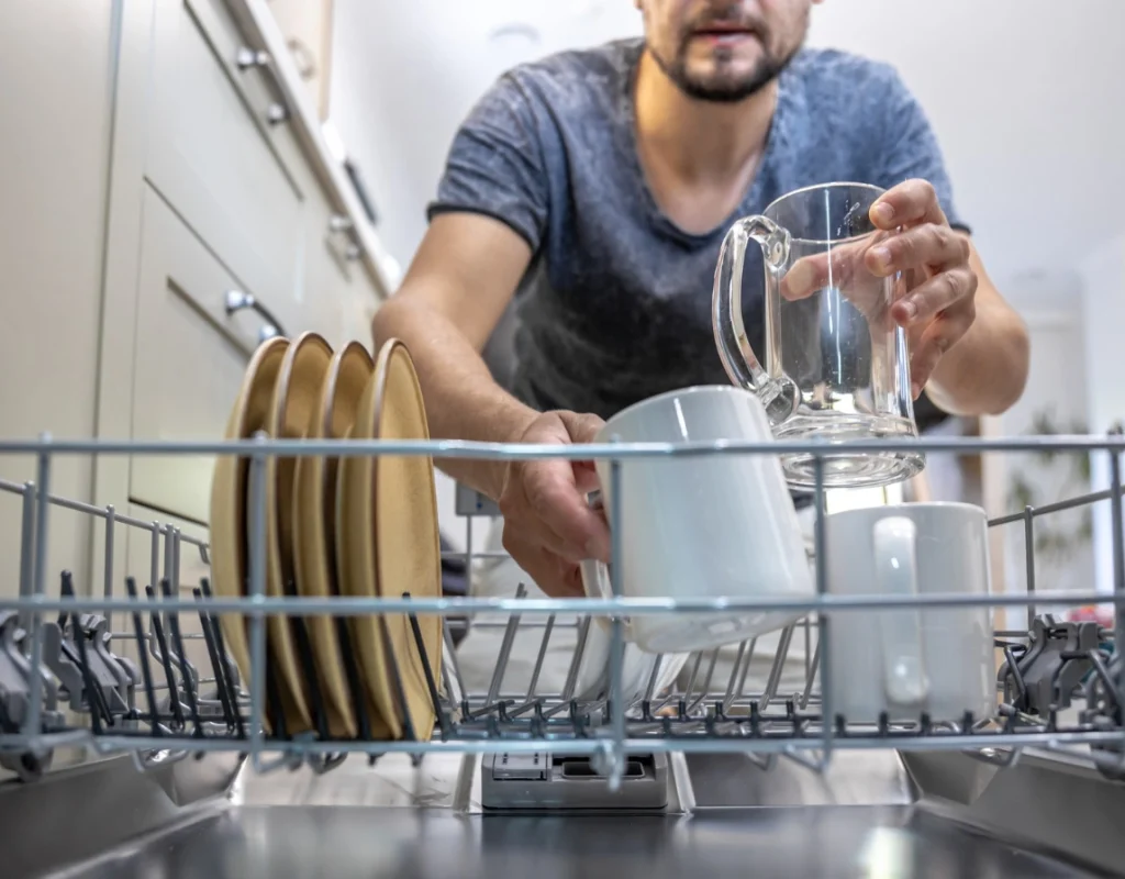 National City CA plumber performing professional dishwasher installation with secure water line connections. National City CA plumber performing professional dishwasher installation with secure water line connections.